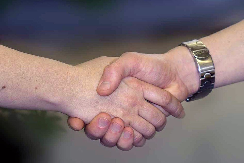 Symbolbild Begrüssung